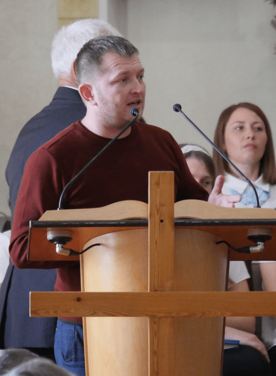Russian pastor Vitaliy Bak speaking in church